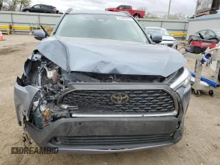2023 Toyota Corolla Cross XLE with VIN 7MUDAABG1PV052040, listed as a Copart auction lot 51840315 with 43,228 mi miles and Salvage title. Bid and sale history available at DreamBid. Image 5.