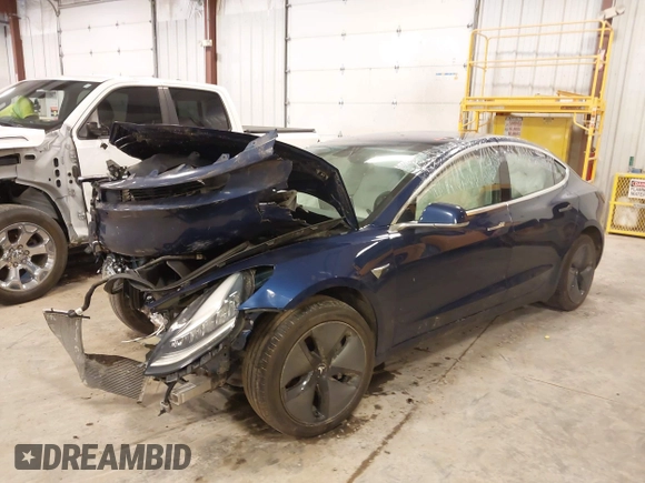 2018 Tesla Model 3 Long Range Battery with VIN 5YJ3E1EB7JF086201, listed as a IAAI auction lot 41965193 with 99,231 mi miles and . Bid and sale history available at DreamBid. Image 19.