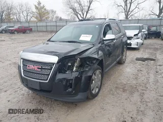 2015 GMC Terrain SLT z VIN 2GKFLYE37F6251170, wystawiony jako IAAI lot #41690412 z przebiegiem 129 756 mil mil oraz . Historia ofert i sprzedaży dostępna na DreamBid. Obrazek 2.