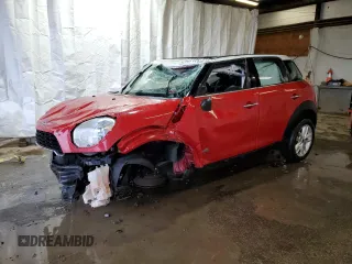2014 MINI Countryman S z VIN WMWZC5C51EWP40354, wystawiony jako Copart lot #57807125 z przebiegiem Nie podano mil oraz Szkoda całkowita • Salvage title. Historia ofert i sprzedaży dostępna na DreamBid. Obrazek 1.