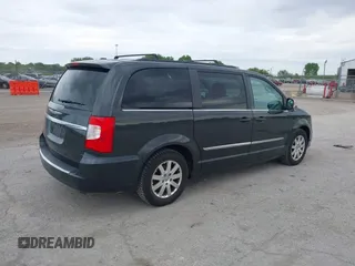 2012 Chrysler Town & Country Touring L with VIN 2C4RC1CG1CR163442, listed as a IAAI auction lot 42207924 with 197,111 mi miles and . Bid and sale history available at DreamBid. Image 4.