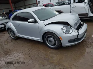 2012 Volkswagen Beetle 2.5L PZEV with VIN 3VWJP7ATXCM601206, listed as a IAAI auction lot 41733311 with 111,742 mi miles. Bid and sale history available at carsss.com. Image 1.
