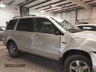 2006 Honda Pilot EX with VIN 2HKYF18416H534697, listed as a IAAI auction lot 41715642 with 224,093 mi miles and . Bid and sale history available at DreamBid. Image 12.