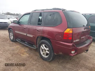 2003 GMC Envoy SLT z VIN 1GKDS13S532314397, wystawiony jako IAAI lot #41184274 z przebiegiem 232 750 mil mil oraz . Historia ofert i sprzedaży dostępna na DreamBid. Obrazek 3.