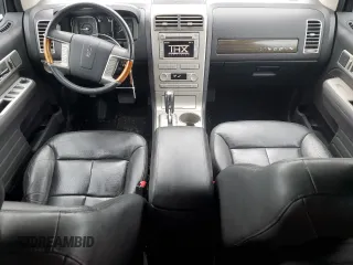 2007 Lincoln MKX z VIN 2LMDU88C07BJ17847, wystawiony jako Copart lot #53029065 z przebiegiem 158 502 mil mil oraz Szkoda całkowita • Salvage title. Historia ofert i sprzedaży dostępna na DreamBid. Obrazek 8.