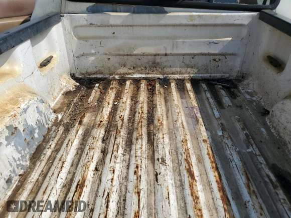 1997 Ford Ranger XLT with VIN 1FTCR10A8VPB29636, listed as a Copart auction lot 57250435 with 215,537 mi miles and Salvage title. Bid and sale history available at DreamBid. Image 10.