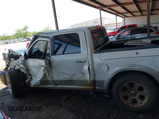 2009 Dodge 1500 Laramie z VIN 1D3HV13TX9J519720, wystawiony jako IAAI lot #42055968 z przebiegiem 190 226 mil mil oraz . Historia ofert i sprzedaży dostępna na DreamBid. Obrazek 14.