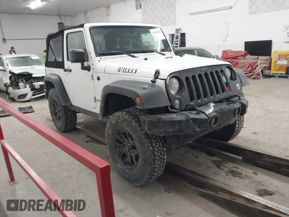 2016 Jeep Wrangler Sport with VIN 1C4AJWAG9GL261958, listed as a IAAI auction lot 41595490 with 32,433 mi miles and . Bid and sale history available at carsss.com. Image 1.