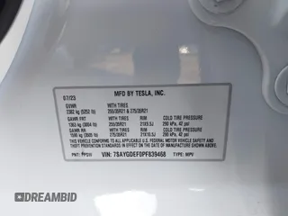 2023 Tesla Model Y Performance with VIN 7SAYGDEF0PF839468, listed as a IAAI auction lot 41609263 with 25,434 mi miles and . Bid and sale history available at DreamBid. Image 9.