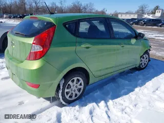 2013 Hyundai Accent GL with VIN KMHCT5AE5DU115490, listed as a IAAI auction lot 41598395 with 86,610 mi miles. Bid and sale history available at carsss.com. Image 4.