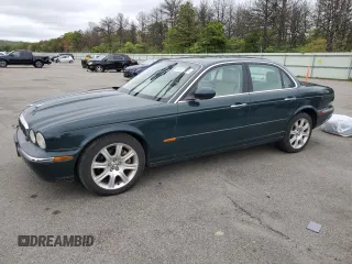 2004 Jaguar XJ 8 z VIN SAJEA71C24SG07794, wystawiony jako Copart lot #58187785 z przebiegiem 110 081 mil mil oraz Czysty tytuł • Clean title. Historia ofert i sprzedaży dostępna na DreamBid. Obrazek 1.
