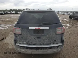 2014 GMC Acadia SLT z VIN 1GKKRRKDXEJ124821, wystawiony jako Copart lot #50989945 z przebiegiem 125 355 mil mil oraz Szkody całkowita. Historia ofert i sprzedaży dostępna na DreamBid. Obrazek 6.