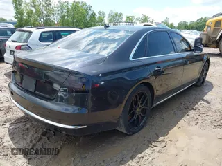 2011 Audi A8 с VIN WAURVAFDXBN020316, выставлен на аукционе IAAI как лот 42297622 с пробегом 156 881 миль миль и . История ставок и продаж доступна на DreamBid. Изображение 4.