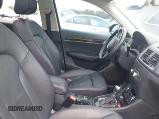 2016 Audi Q3 Premium Plus with VIN WA1BFCFSXGR022587, listed as a IAAI auction lot 42133288 with 141,609 mi miles. Bid and sale history available at carsss.com. Image 5.