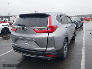 2018 Honda CR-V EX-L with VIN 7FARW2H88JE051829, listed as a IAAI auction lot 41517779 with 69,857 mi miles. Bid and sale history available at carsss.com. Image 4.