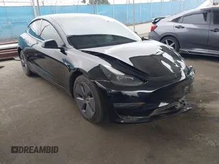 2023 Tesla Model 3 with VIN 5YJ3E1EA7PF473749, listed as a IAAI auction lot 41921478 with 21,483 mi miles and . Bid and sale history available at DreamBid. Image 1.