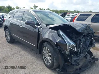2018 Cadillac XT5 Luxury FWD with VIN 1GYKNCRS8JZ134536, listed as a IAAI auction lot 42459855 with 75,809 mi miles and . Bid and sale history available at DreamBid. Image 1.