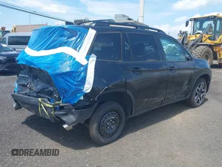 2023 Honda Passport Elite with VIN 5FNYF8H01PB030270, listed as a IAAI auction lot 42667744 with 7,931 mi miles and . Bid and sale history available at DreamBid. Image 4.