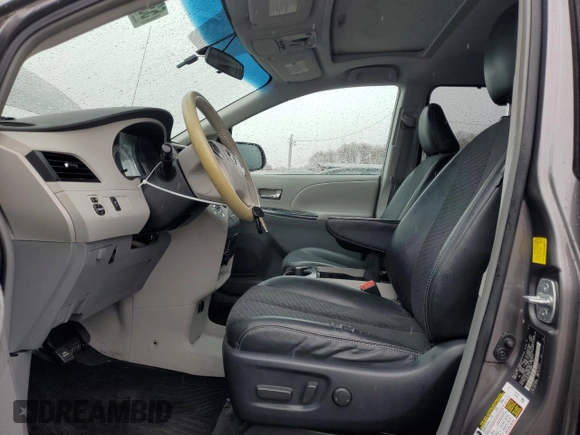 2011 Toyota Sienna SE with VIN 5TDXK3DC9BS135900, listed as a Copart auction lot 53864965 with 217,198 mi miles and Salvage Title. Bid and sale history available at DreamBid. Image 7.
