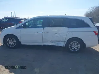 2011 Honda Odyssey EX-L with VIN 5FNRL5H69BB062666, listed as a IAAI auction lot 41829319 with 152,105 mi miles and . Bid and sale history available at carsss.com. Image 14.