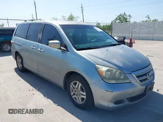 2007 Honda Odyssey EX z VIN 5FNRL38467B132814, wystawiony jako IAAI lot #42023791 z przebiegiem 242 150 mil mil oraz . Historia ofert i sprzedaży dostępna na DreamBid. Obrazek 1.
