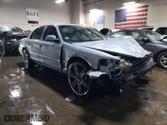 2010 Mercury Grand Marquis LS z VIN 2MEBM7FV1AX630474, wystawiony jako Copart lot #52318615 z przebiegiem Nie podano mil oraz Szkoda całkowita • Salvage title. Historia ofert i sprzedaży dostępna na DreamBid. Obrazek 4.