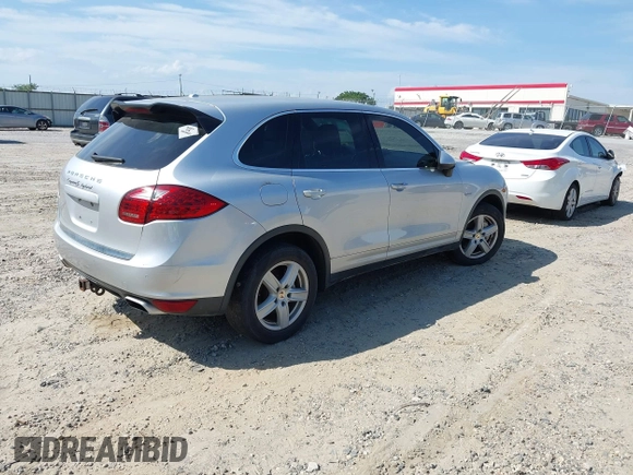 2012 Porsche Cayenne S Hybrid z VIN WP1AE2A20CLA92424, wystawiony jako IAAI lot #42315279 z przebiegiem 129 119 mil mil oraz . Historia ofert i sprzedaży dostępna na DreamBid. Obrazek 4.