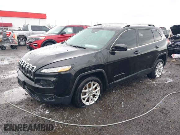 2015 Jeep Cherokee Latitude with VIN 1C4PJLCB0FW676917, listed as a IAAI auction lot 41928270 with 181,134 mi miles and . Bid and sale history available at carsss.com. Image 17.