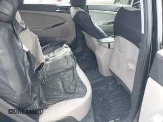 2016 Hyundai Tucson Limited with VIN KM8J33A27GU181240, listed as a IAAI auction lot 42183028 with 104,557 mi miles. Bid and sale history available at carsss.com. Image 8.