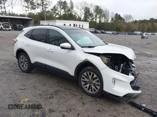 2020 Ford Escape Titanium Hybrid z VIN 1FMCU9DZ0LUC56274, wystawiony jako IAAI lot #41256530 z przebiegiem 43 502 mil mil oraz . Historia ofert i sprzedaży dostępna na DreamBid. Obrazek 1.