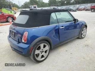 2007 MINI Convertible S with VIN WMWRH33567TJ45123, listed as a Copart auction lot 55702735 with 60,117 mi miles and Salvage title. Bid and sale history available at DreamBid. Image 3.