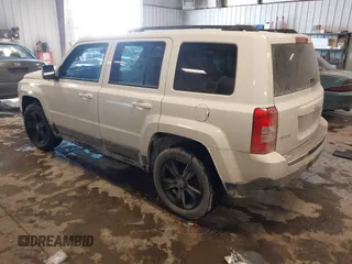 2014 Jeep Patriot Latitude with VIN 1C4NJRFB4ED864114, listed as a IAAI auction lot 41639732 with 103,119 mi miles. Bid and sale history available at carsss.com. Image 3.