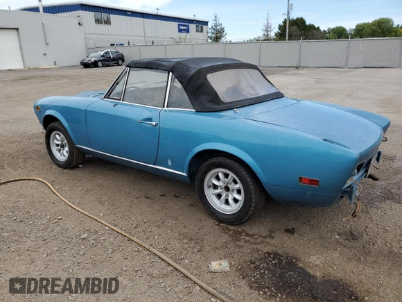 1974 FIAT 124 Spider z VIN 124CS10081683, wystawiony jako Copart lot #58650195 z przebiegiem 143 647 mil mil oraz Czysty tytuł • Clean title. Historia ofert i sprzedaży dostępna na DreamBid. Obrazek 2.
