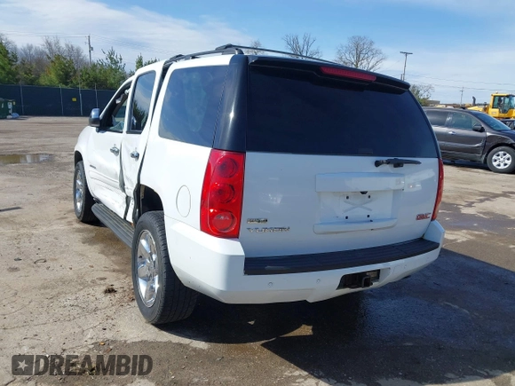 2011 GMC Yukon SLE with VIN 1GKS2AE01BR351651, listed as a IAAI auction lot 41942032 with 337,165 mi miles. Bid and sale history available at carsss.com. Image 3.