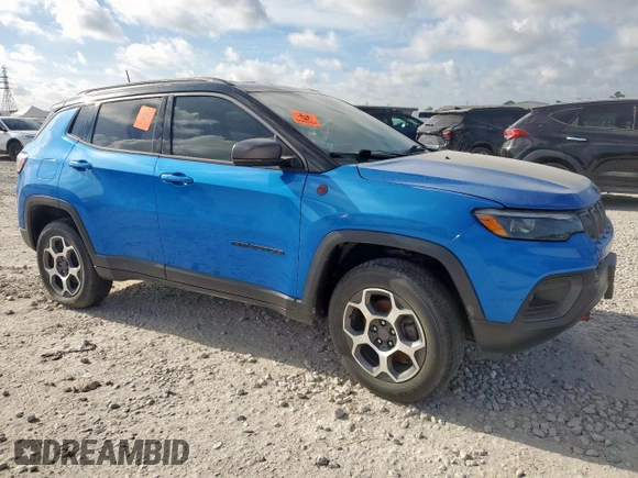 2022 Jeep Compass Trailhawk with VIN 3C4NJDDB6NT162831, listed as a Copart auction lot 66130235 with 34,762 mi miles and Salvage title. Bid and sale history available at DreamBid. Image 4.