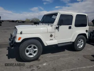 2000 Jeep Wrangler Sahara z VIN 1J4FA59S6YP790541, wystawiony jako Copart lot #53837885 z przebiegiem 137 827 mil mil oraz Szkoda całkowita • Salvage title. Historia ofert i sprzedaży dostępna na DreamBid. Obrazek 1.