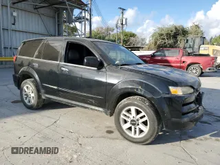 2002 Isuzu Axiom with VIN 4S2CE58XX24612512, listed as a Copart auction lot 77952574 with 201,436 mi miles and Salvage Title. Bid and sale history available at carsss.com. Image 4.