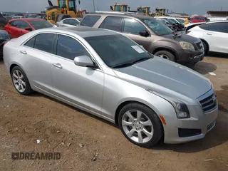 2014 Cadillac ATS Luxury RWD with VIN 1G6AB5RX7E0143954, listed as a IAAI auction lot 42156629 with 79,619 mi miles and . Bid and sale history available at DreamBid. Image 1.