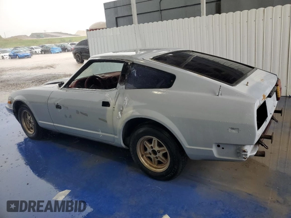 1982 Datsun 280ZX z VIN JN1HZ04S5CX431646, wystawiony jako Copart lot #55607255 z przebiegiem 173 546 mil mil oraz Tytuł czysty. Historia ofert i sprzedaży dostępna na DreamBid. Obrazek 2.