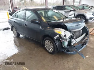 2016 Nissan Versa S z VIN 3N1CN7AP9GL860918, wystawiony jako IAAI lot #41862135 z przebiegiem 72 017 mil mil oraz . Historia ofert i sprzedaży dostępna na DreamBid. Obrazek 1.