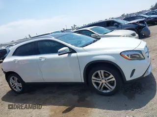2015 Mercedes-Benz GLA 250 z VIN WDCTG4GB6FJ132331, wystawiony jako IAAI lot #42392013 z przebiegiem 72 696 mil mil oraz . Historia ofert i sprzedaży dostępna na DreamBid. Obrazek 14.