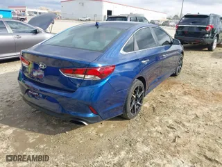 2019 Hyundai Sonata Sport with VIN 5NPE34AF3KH766494, listed as a IAAI auction lot 41677608 with 199,195 mi miles. Bid and sale history available at carsss.com. Image 4.