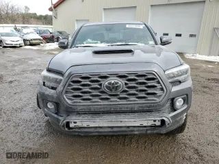 2023 Toyota Tacoma 4WD SR with VIN 3TYCZ5AN2PT156093, listed as a Copart auction lot 45577245 with 33,687 mi miles and Salvage Title. Bid and sale history available at carsss.com. Image 5.