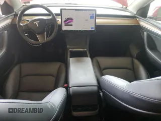 2023 Tesla Model Y Long Range z VIN 7SAYGAEE8PF701618, wystawiony jako Copart lot #57573875 z przebiegiem 39 463 mil mil oraz Szkoda całkowita • Salvage title. Historia ofert i sprzedaży dostępna na DreamBid. Obrazek 8.
