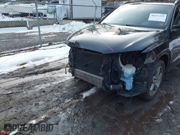 2015 Audi Q3 Premium Plus with VIN WA1EFCFS5FR008723, listed as a IAAI auction lot 41472323 with 112,709 mi miles and . Bid and sale history available at DreamBid. Image 6.