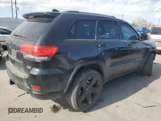 2014 Jeep Grand Cherokee Overland with VIN 1C4RJFCT2EC106002, listed as a Copart auction lot 48763675 with 143,011 mi miles and Salvage Title. Bid and sale history available at DreamBid. Image 3.