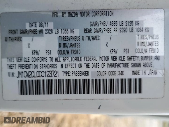 2012 Mazda 5 Touring z VIN JM1CW2CL0C0123721, wystawiony jako Copart lot #52415065 z przebiegiem 168 659 mil mil oraz Szkoda całkowita • Salvage title. Historia ofert i sprzedaży dostępna na DreamBid. Obrazek 14.