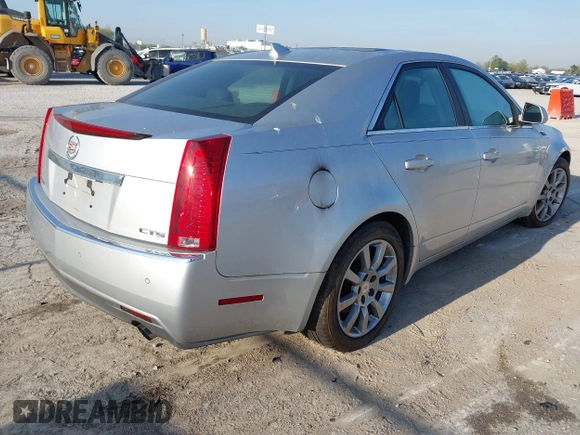 2009 Cadillac CTS RWD with VIN 1G6DV57V590125951, listed as a IAAI auction lot 42005788 with 160,133 mi miles and . Bid and sale history available at carsss.com. Image 4.