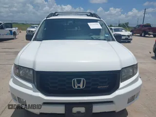 2014 Honda Ridgeline Sport with VIN 5FPYK1F71EB011340, listed as a IAAI auction lot 42741956 with 156,149 mi miles and . Bid and sale history available at DreamBid. Image 12.