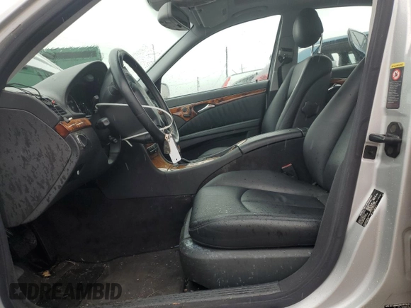 2003 Mercedes-Benz E 320 with VIN WDBUF65J13A207806, listed as a Copart auction lot 55313995 with 146,275 mi miles and Salvage Title. Bid and sale history available at DreamBid. Image 7.